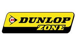 The logo for Dunlop Zone with a yellow and black background